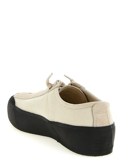 Sneakers by Stone Island for men in bos taurus suede calfskin leather & polyester beige presents a impeccable silhouette as Men's Low Top Bos Taurus Suede Calfskin Leather & Polyester Sneakers, expertly defined by a impeccable low-top style for a impeccable, high-fashion look.