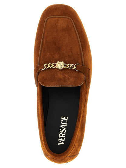 Flat Loafer Slip-On Slippers Shoes by Versace for women in suede calfskin leather brown showcases a timeless silhouette from the Medusa Women's Suede Calfskin Leather Flat Loafer Slip-On Slippers Shoes collection, featuring a timeless flat and for a timeless finish.
