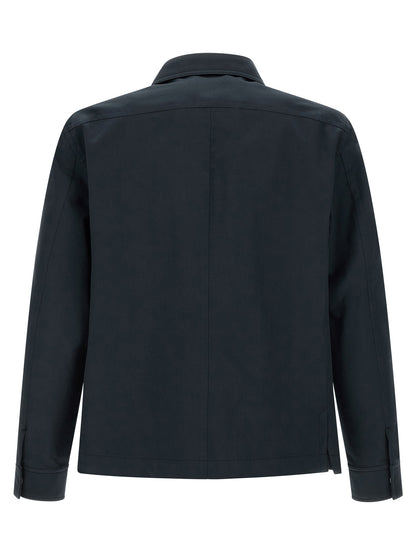 Overshirt by Tom Ford for men in polyamide cotton twill blue features an architectural silhouette with a refined and elegant for a architectural look.
