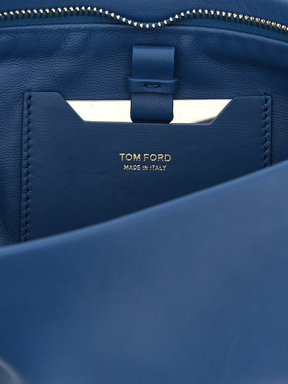Clutch Handbag by Tom Ford for women in lamb leather blue features a statuesque silhouette, showcasing a secure zipper and organized with versatile for statuesque evening wear.
