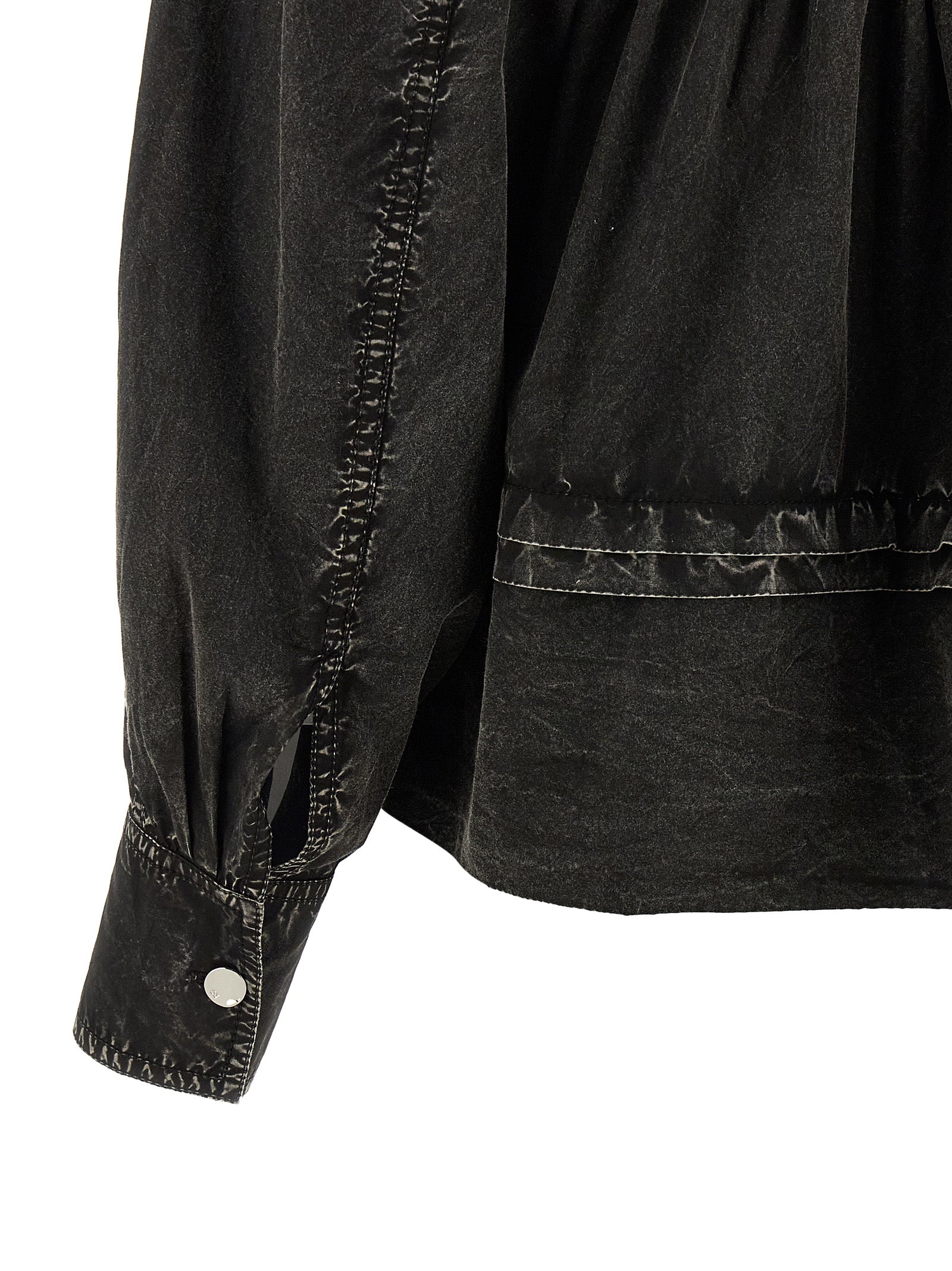 Blouse by Ganni for women in organic cotton black, featuring a nuanced and nuanced for a sophisticated finish.
