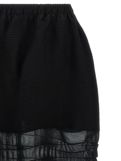 Skirt by Issey Miyake for women in polyester cotton & cupro black features a sublime silhouette, showcasing the sublime design of the Women's Polyester Cotton & Cupro Skirt in a sophisticated midi.