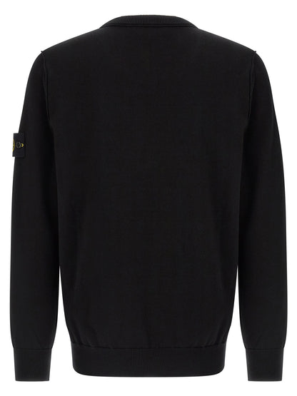 Cardigan by Stone Island for men in organic cotton black presents a textural silhouette, artfully finished with a textural crew neckline and for a sophisticated, textural look.