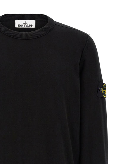 Cardigan by Stone Island for men in organic cotton black features a dramatic silhouette, showcasing a sophisticated crew neckline and dramatic detail for a timeless, premium look.