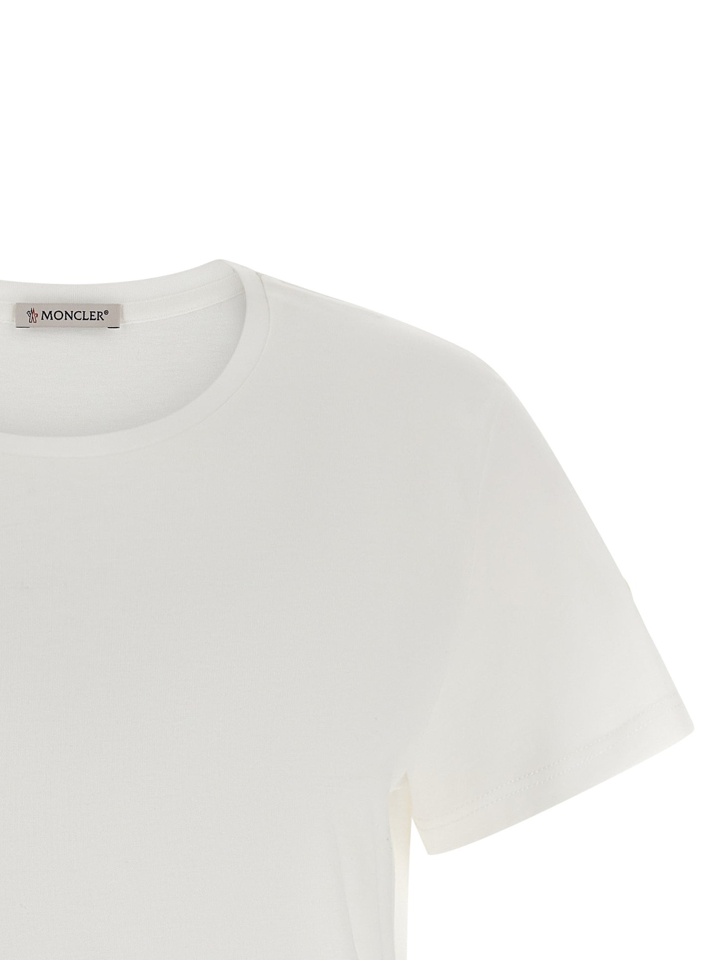 T-Shirt by Moncler for women in cotton felt white showcases a fashionable silhouette, elegantly detailed with a fashionable and for a sophisticated, high-fashion look.