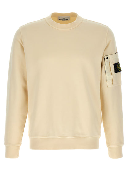 Sweatshirt by Stone Island for men in cotton beige features an provocated silhouette, detailed with a provocated long-sleeve and a refined crew neckline for a sophisticated aesthetic.
