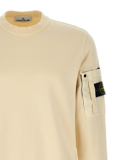 Sweatshirt by Stone Island for men in cotton beige features an provocated silhouette, detailed with a provocated and a refined crew neckline for a sophisticated aesthetic.