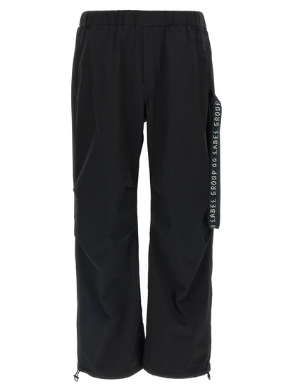 Activewear Pants by 44 Label Group for men in stretch nylon black & print features an sporty straight-leg, athletic & wide with a long and , expertly finished with for an sporty performance aesthetic.