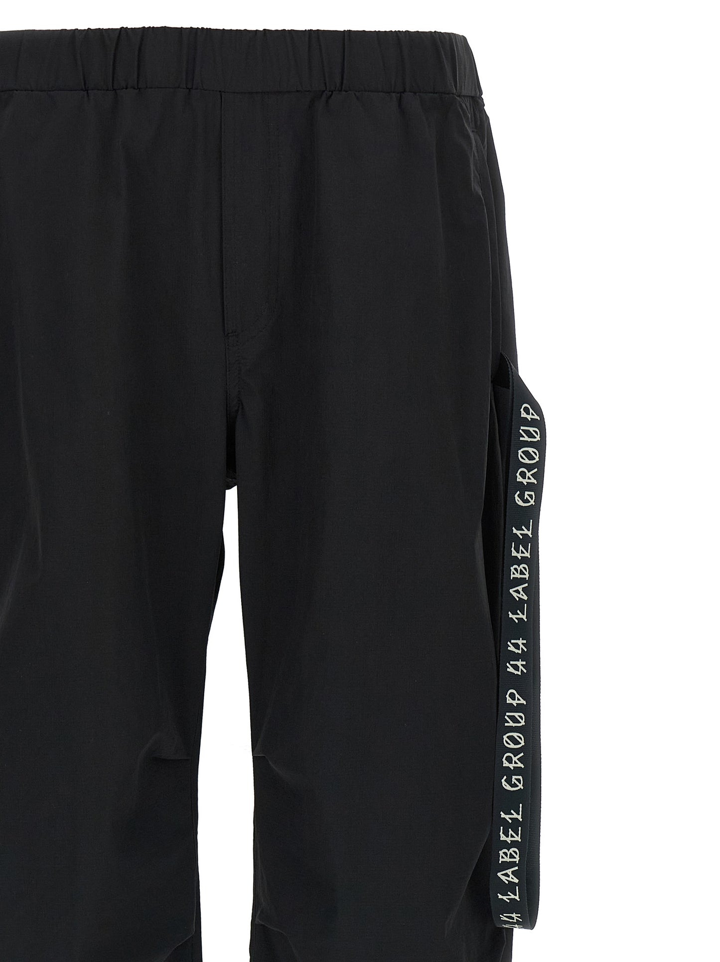 Activewear Pants by 44 Label Group for men in stretch nylon black & print features an contemporary straight-leg, athletic & wide with a long and , showcasing for a contemporary finish.