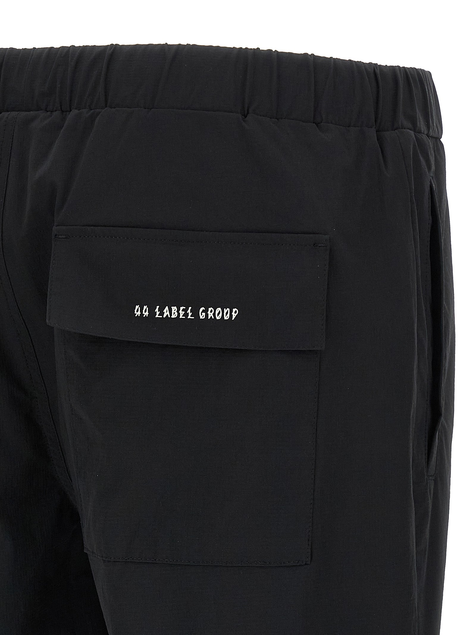 Activewear Pants by 44 Label Group for men in stretch nylon black & print features an versatile silhouette, integrating performance-ready with a versatile straight-leg, athletic & wide, long, and .