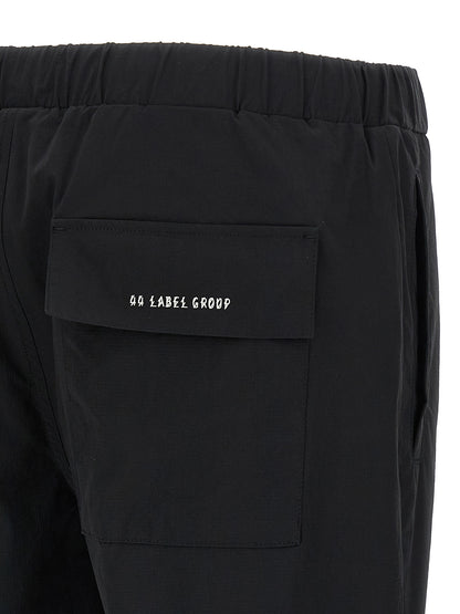 Activewear Pants by 44 Label Group for men in stretch nylon black & print features an versatile silhouette, integrating performance-ready with a versatile straight-leg, athletic & wide, long, and .
