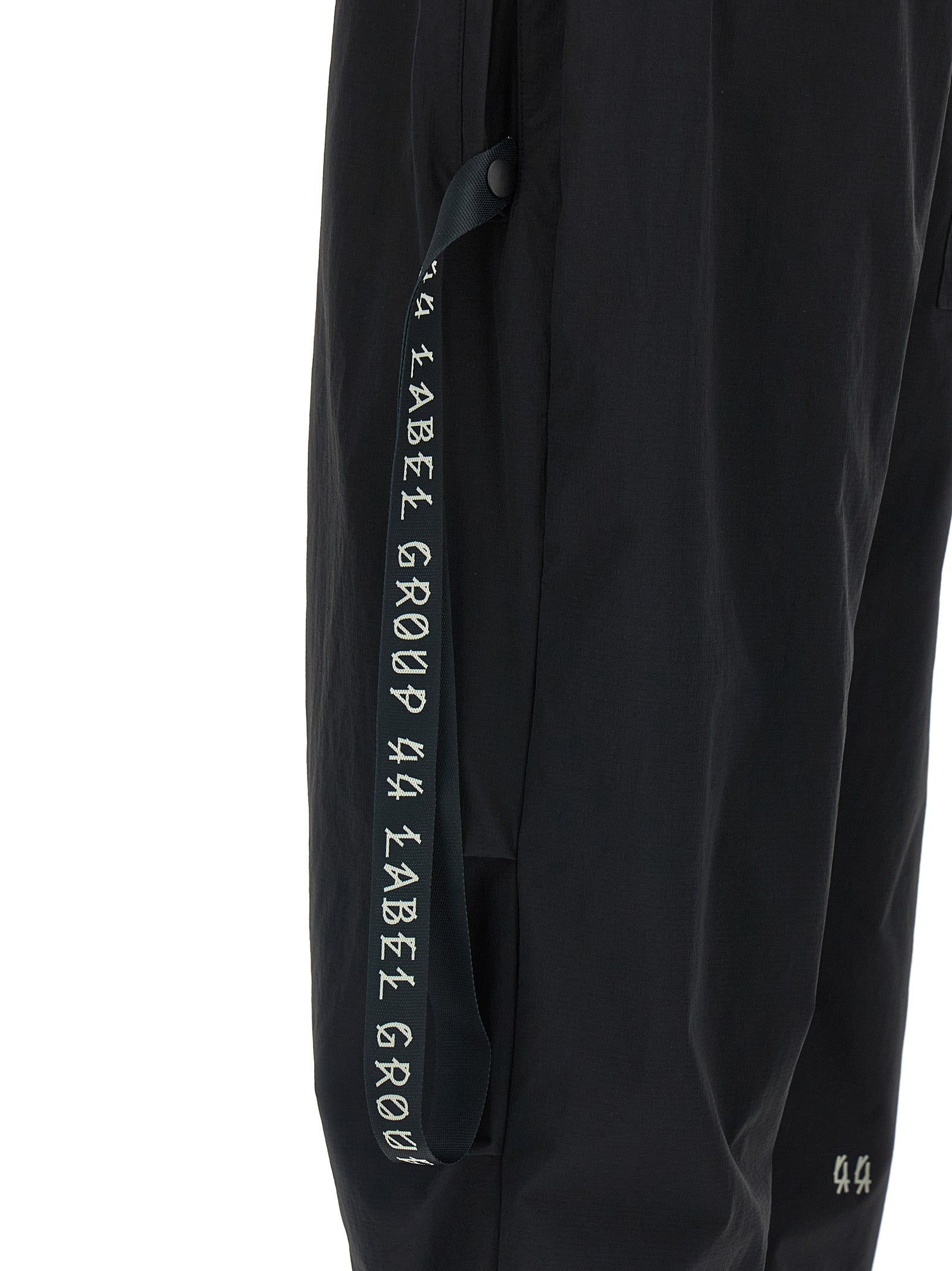 Activewear Pants by 44 Label Group for men in stretch nylon black & print features an streamlined design with , highlighting a streamlined straight-leg, athletic & wide and long cut with a comfortable .