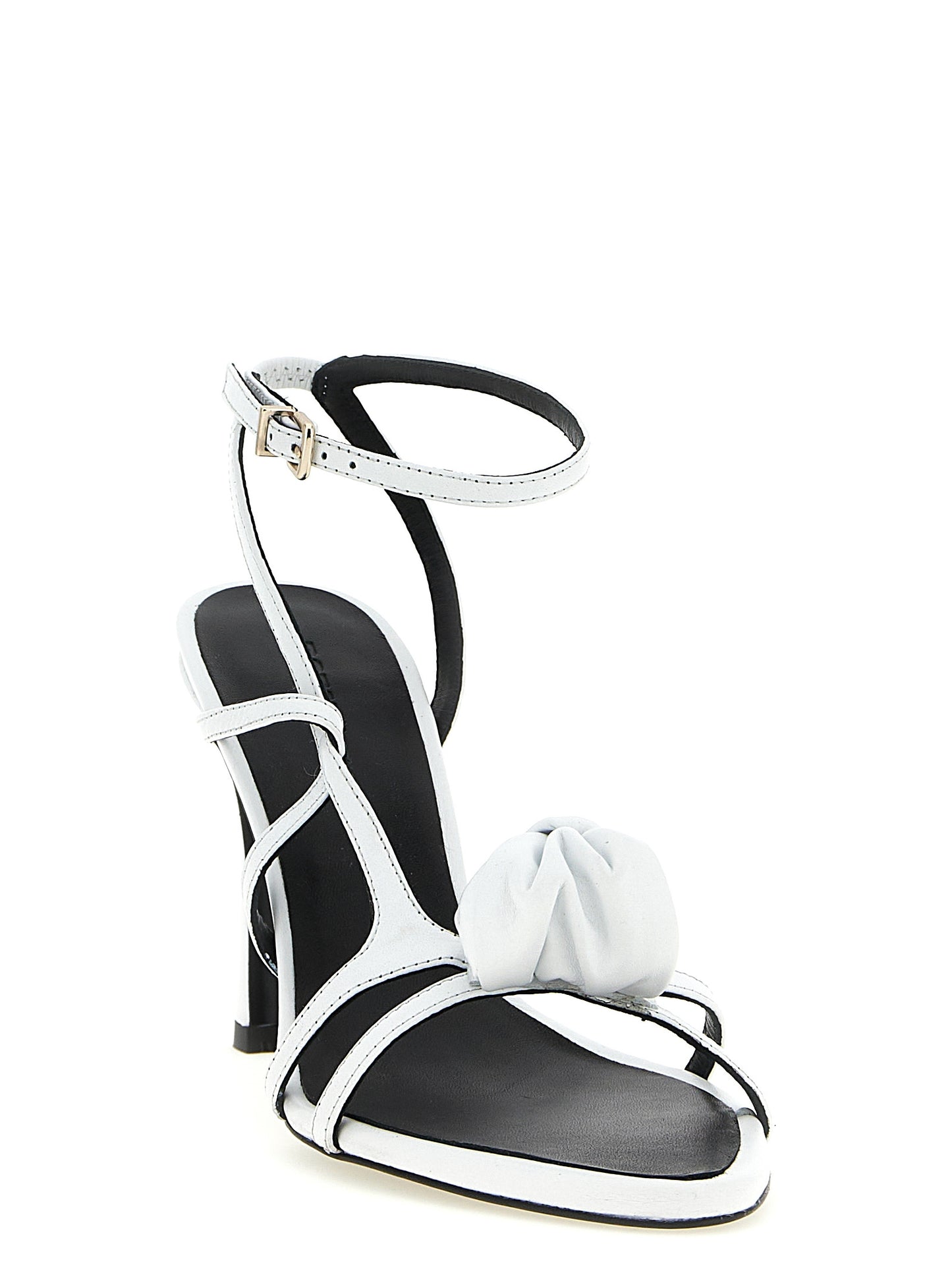 Stiletto Ankle Strap Sandals by ROTATE BIRGER CHRISTENSEN for women in calfskin leather white presents a sculptural silhouette, showcasing the Women's Calfskin Leather Stiletto Ankle Strap Sandals design with a sculptural stiletto and for a premium look.