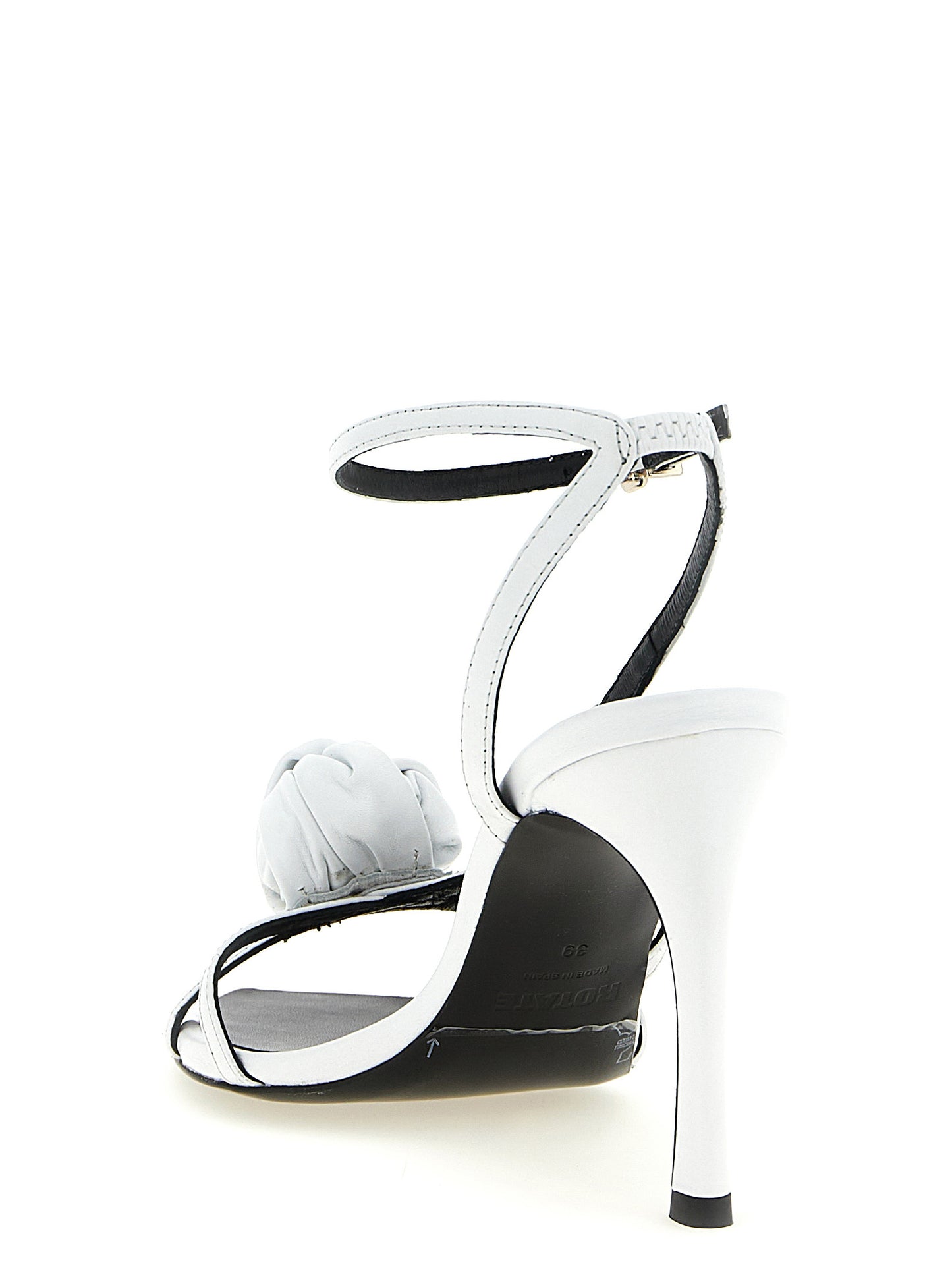 Stiletto Ankle Strap Sandals by ROTATE BIRGER CHRISTENSEN for women in calfskin leather and white presents a captivating silhouette, showcasing the signature style of the Women's Calfskin Leather Stiletto Ankle Strap Sandals with a captivating stiletto and captivating .