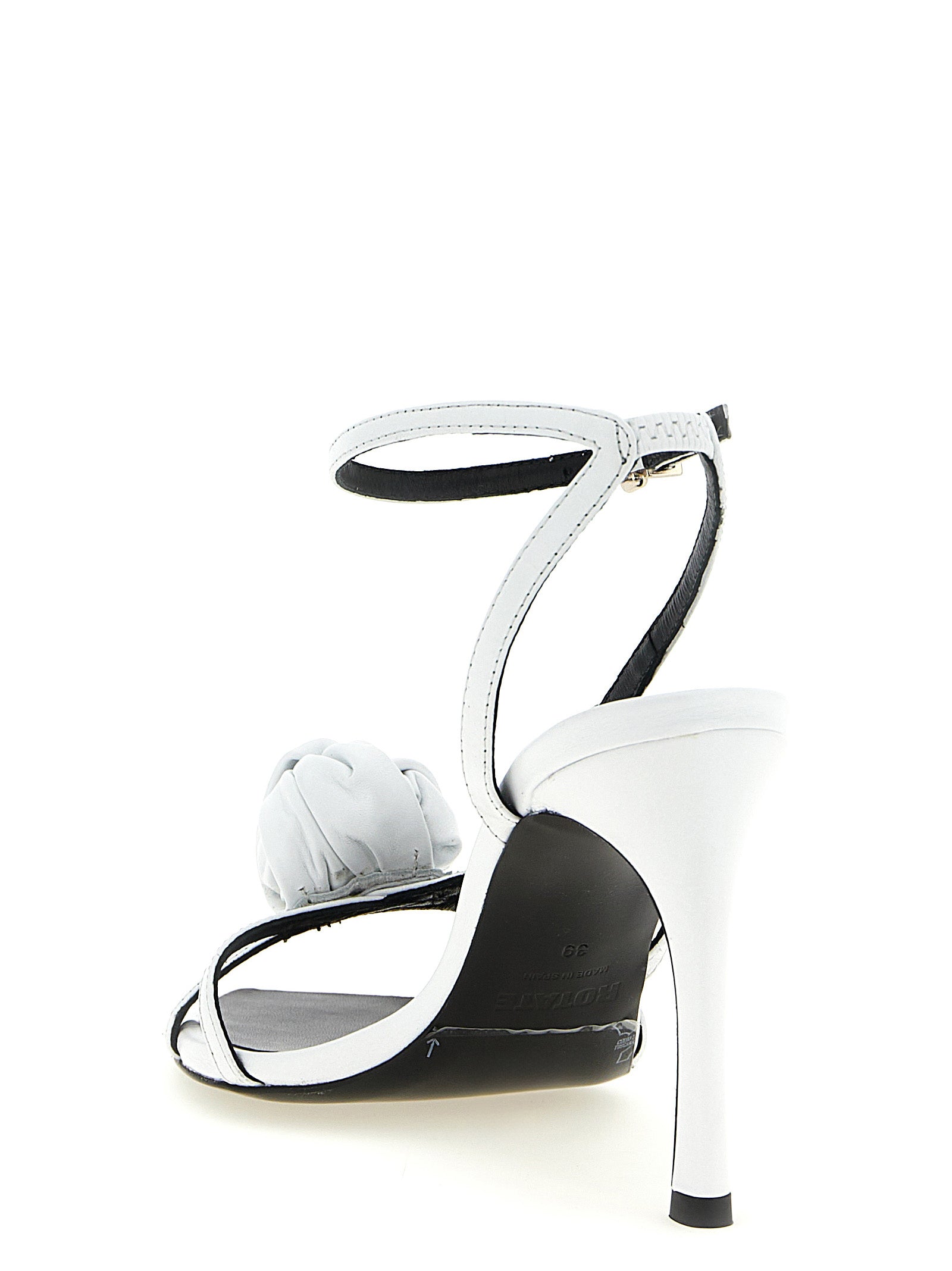 Stiletto Ankle Strap Sandals by ROTATE BIRGER CHRISTENSEN for women in calfskin leather and white presents a captivating silhouette, showcasing the signature style of the Women's Calfskin Leather Stiletto Ankle Strap Sandals with a captivating stiletto and captivating .