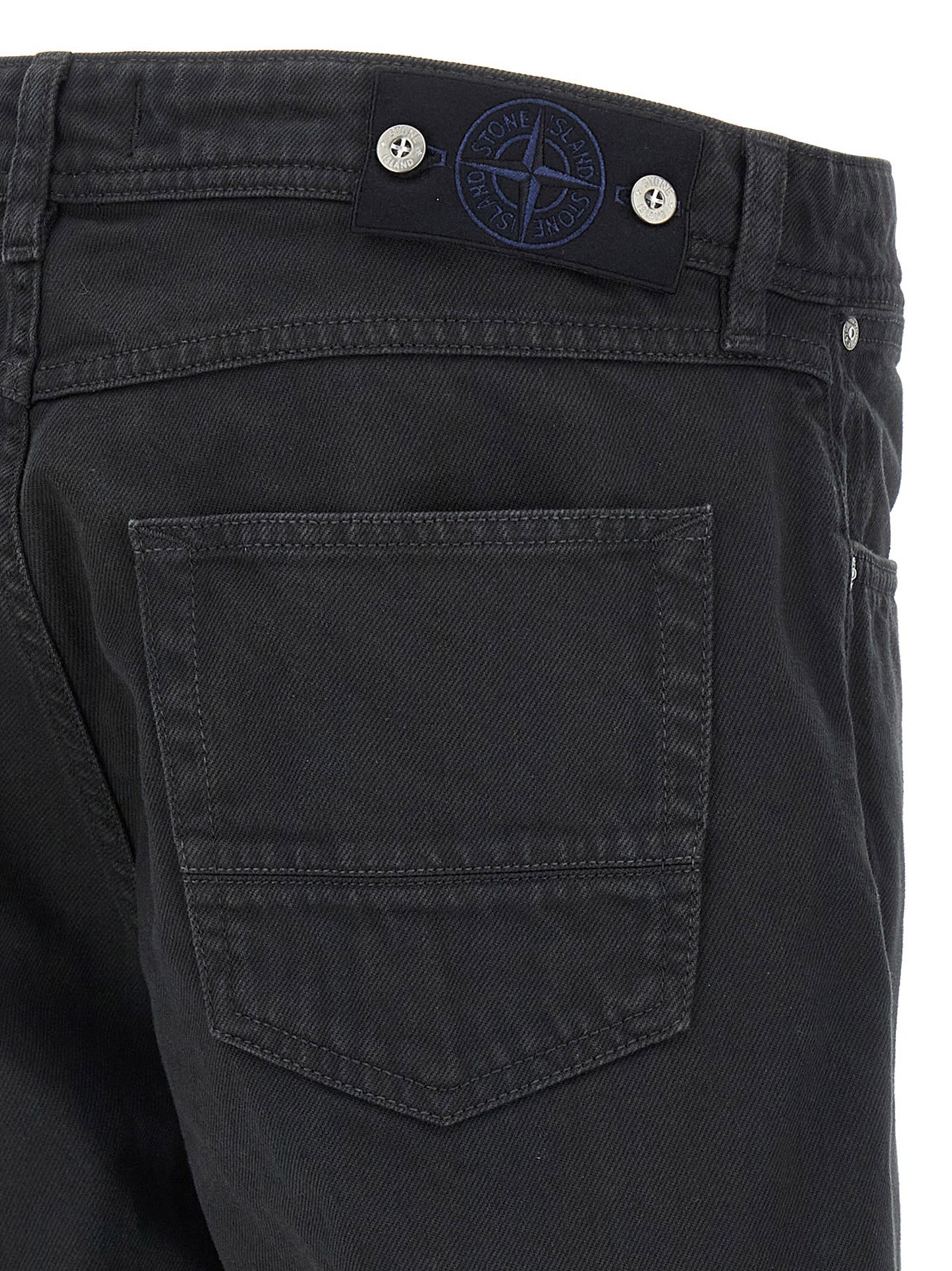 Jeans by Stone Island for men in denim cotton black & signature features a refined silhouette with a refined straight-leg, defined by a and a refined long for a refined finish.
