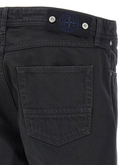 Jeans by Stone Island for men in denim cotton black & signature features a refined silhouette with a refined straight-leg, defined by a and a refined long for a refined finish.
