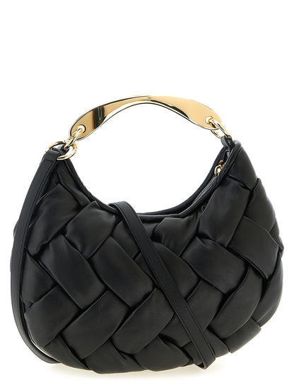 This Sling Handbag by Twinset for women in polyethylene & polyurethane and black presents a sculptural silhouette featuring a secure zipper, ample , and versatile shoulder-strap & handle for a sculptural finish.