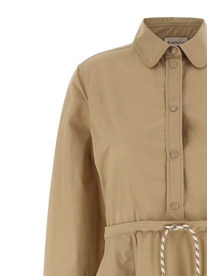 Dress by Moncler for women in cotton polyester felt beige features an magnificent silhouette, artfully detailed with a magnificent and that flows into an magnificent midi long.