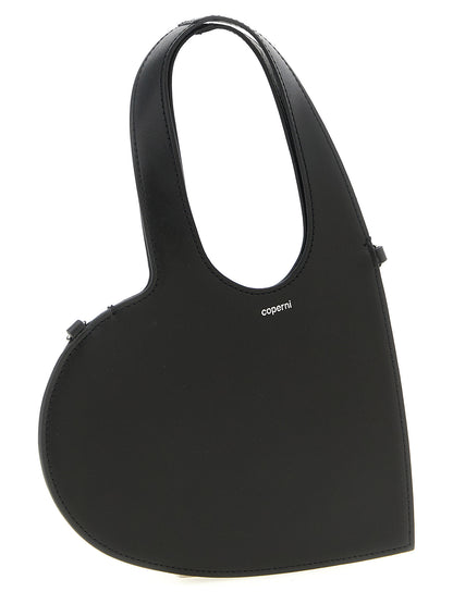 Mini Handbag by Coperni for women in leather black features a signature silhouette, showcasing a secure and signature with versatile shoulder-strap, adjustable-strap & handle for a sophisticated look.
