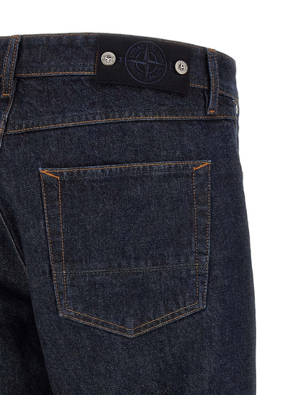 Jeans by Stone Island for men in denim cotton blue & indigo features an sophisticated and straight-leg with a precise long, creating a sophisticated and sophisticated silhouette.