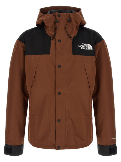 Hooded Windbreaker Jacket by The North Face for men in polyester brown presents a resilient silhouette, artfully detailed with a sophisticated hooded neckline and functional water-resistant, pockets, hooded & windproof for a resilient finish.