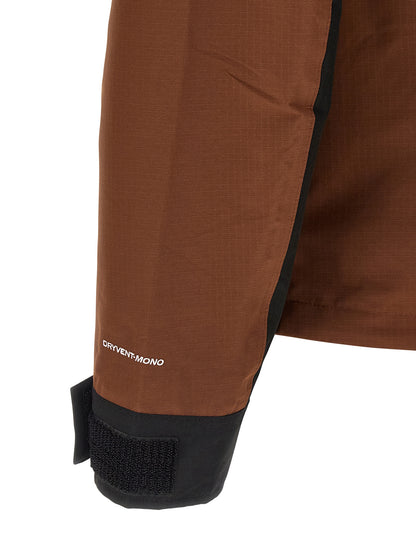 Hooded Windbreaker Jacket by The North Face for men in polyester brown features an magnificent silhouette, showcasing the sophisticated and functional water-resistant, pockets, hooded & windproof for a premium, magnificent look.