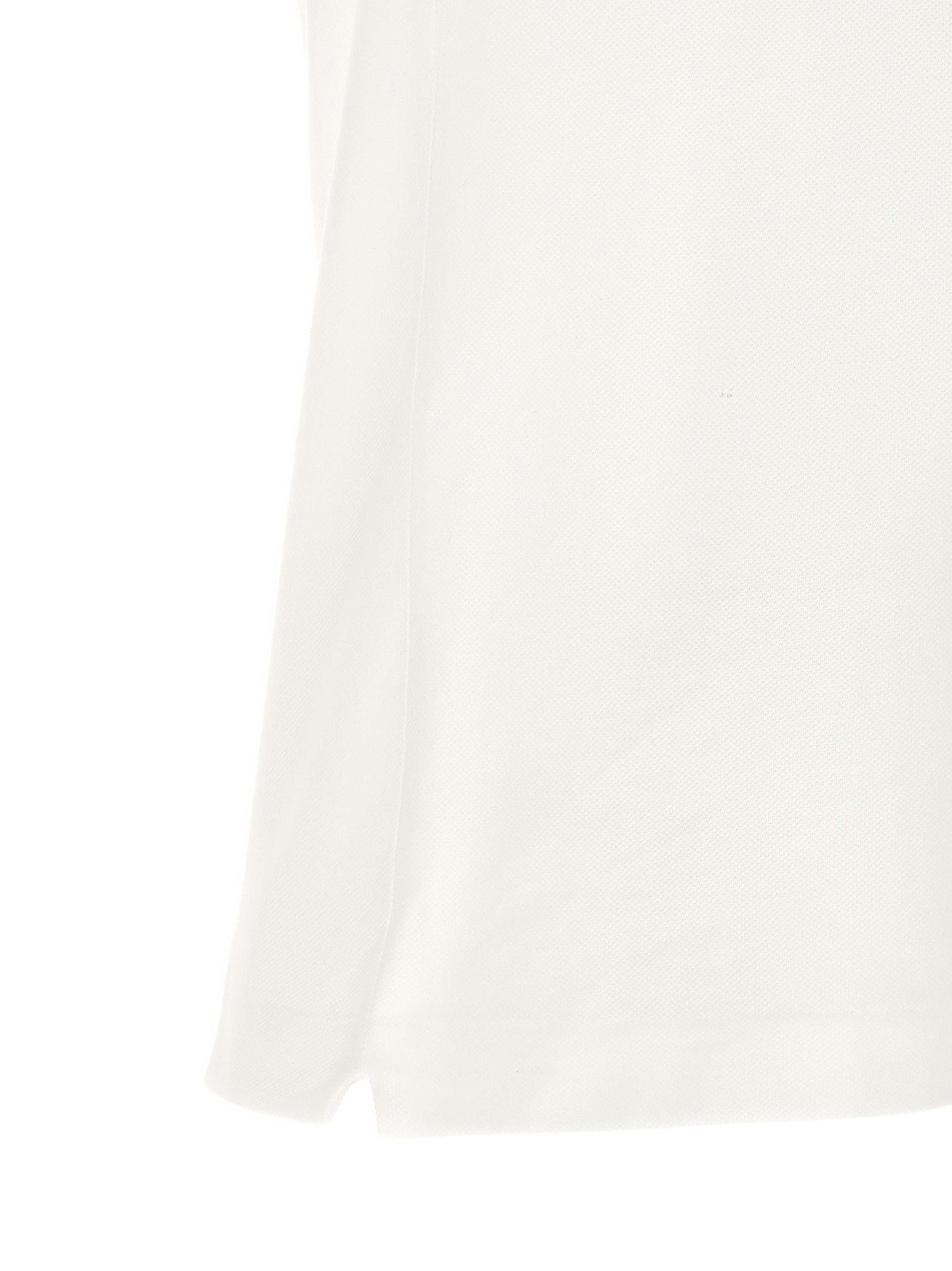 Polo Shirt by Lacoste for men in cotton white showcases a sharp silhouette, detailed with a refined and sharp for a sophisticated finish.
