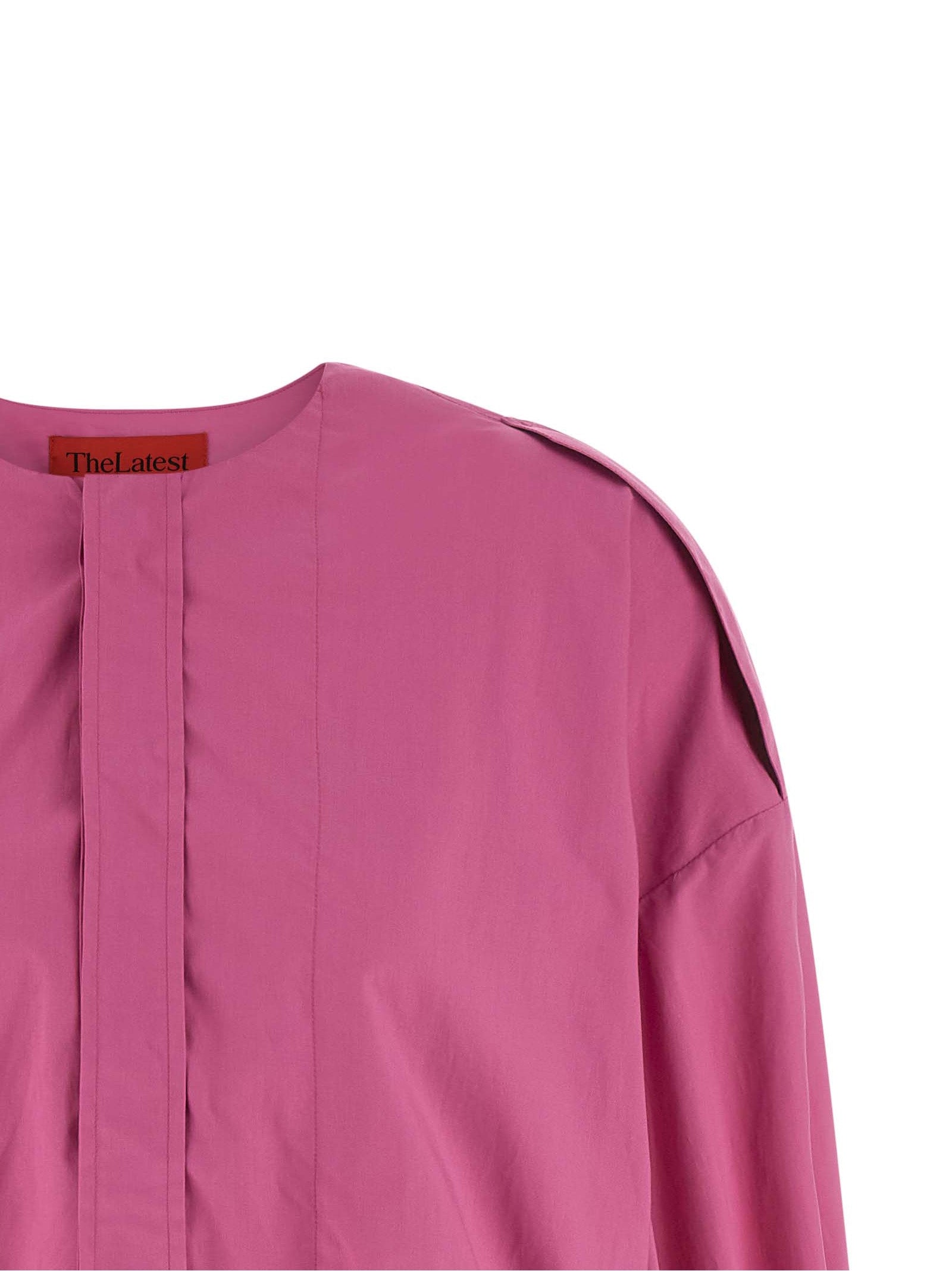 Blouse by THELATEST for women in cotton fuchsia showcases a sleek silhouette, elegantly detailed with a sleek crew neckline and for a sleek finish.
