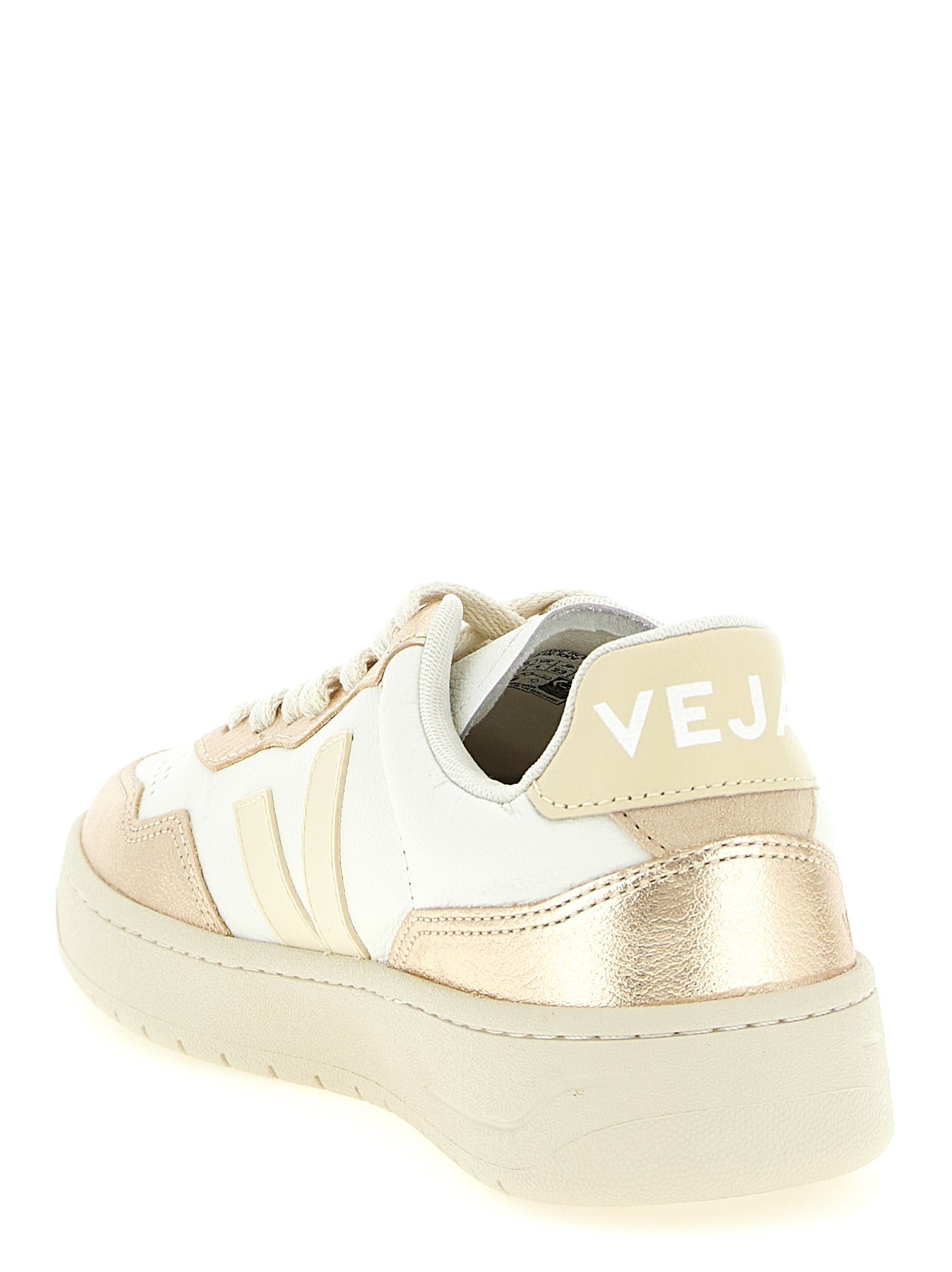 Sneakers by Veja for women in suede leather & rubber gold presents a sumptuous silhouette, artfully capturing the essence of the Women's Low Top Suede Leather & Rubber Sneakers with its sumptuous low-top style design.