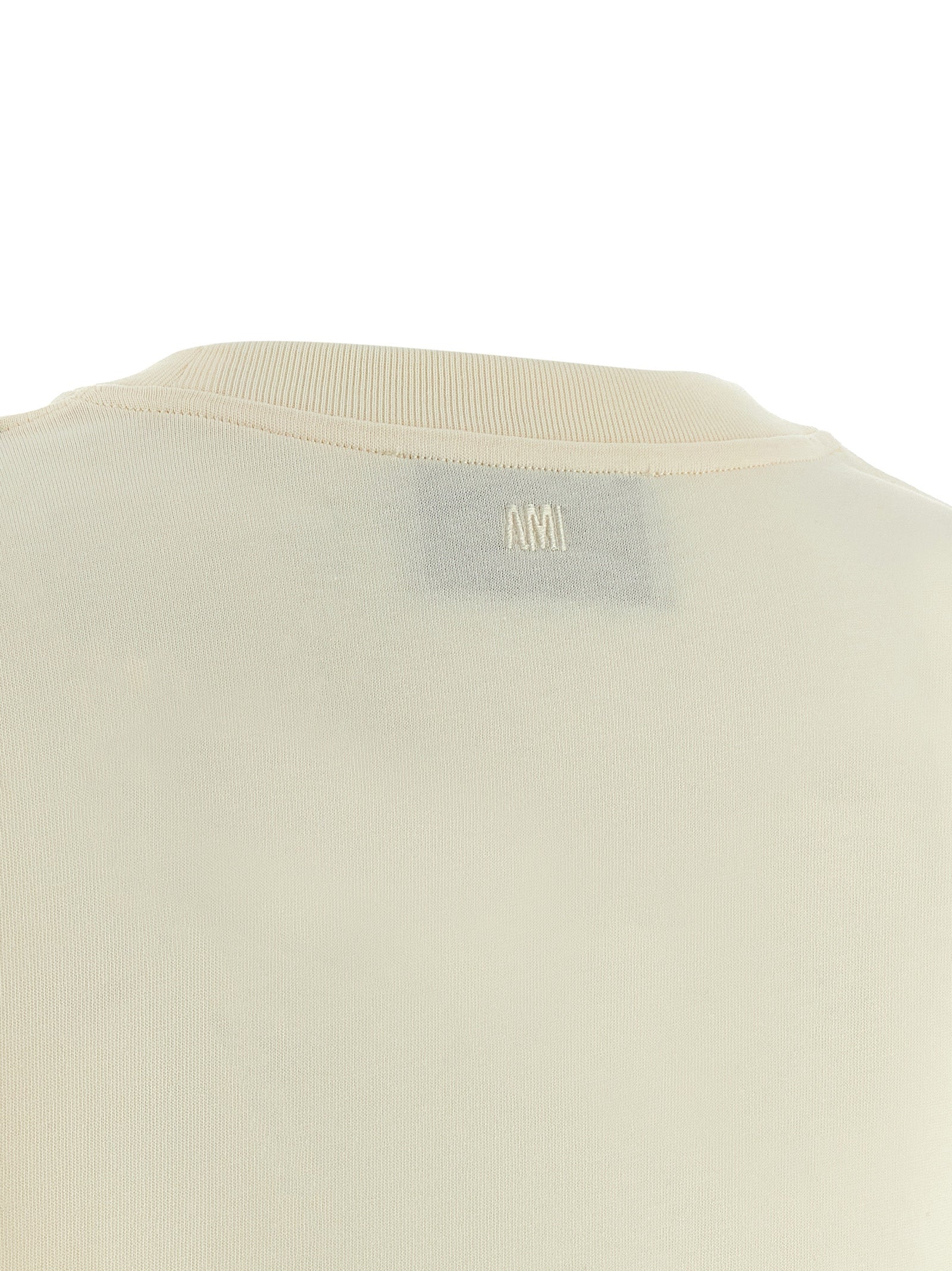T-Shirt by Ami Paris for women in cotton beige showcases a chic silhouette, artfully detailed with a chic and for a chic finish.