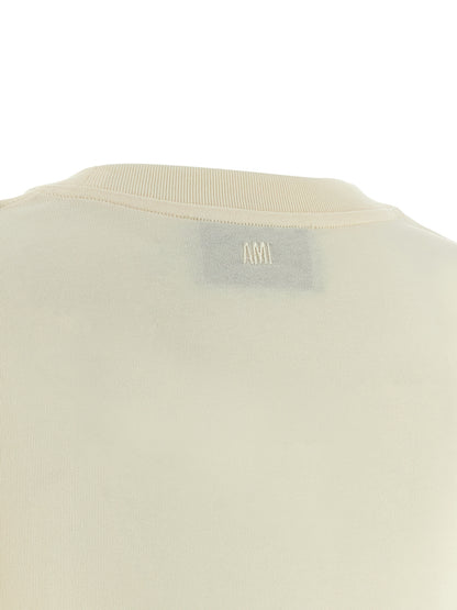 T-Shirt by Ami Paris for women in cotton beige showcases a chic silhouette, artfully detailed with a chic and for a chic finish.