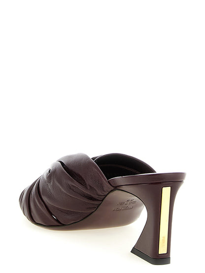 Platform Slider Sandals by Fendi for women in nappa lamb leather bordeaux, gold & signature presents a sculptural silhouette, showcasing the Women's Nappa Lamb Leather Platform Slider Sandals design with a sculptural platform and almond toe style for a premium look.