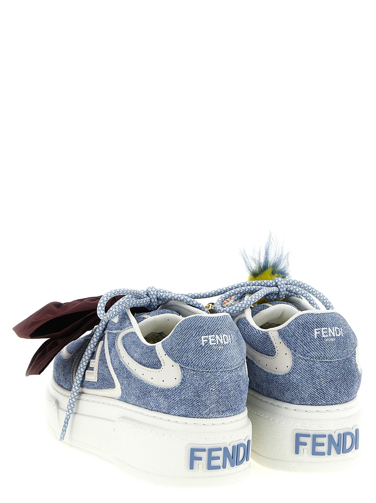 Sneakers by Fendi for women in denim & suede calfskin leather light-blue presents a sumptuous silhouette, artfully capturing the essence of the Women's Fashion Denim & Suede Calfskin Leather Sneakers with its sumptuous fashion style design.
