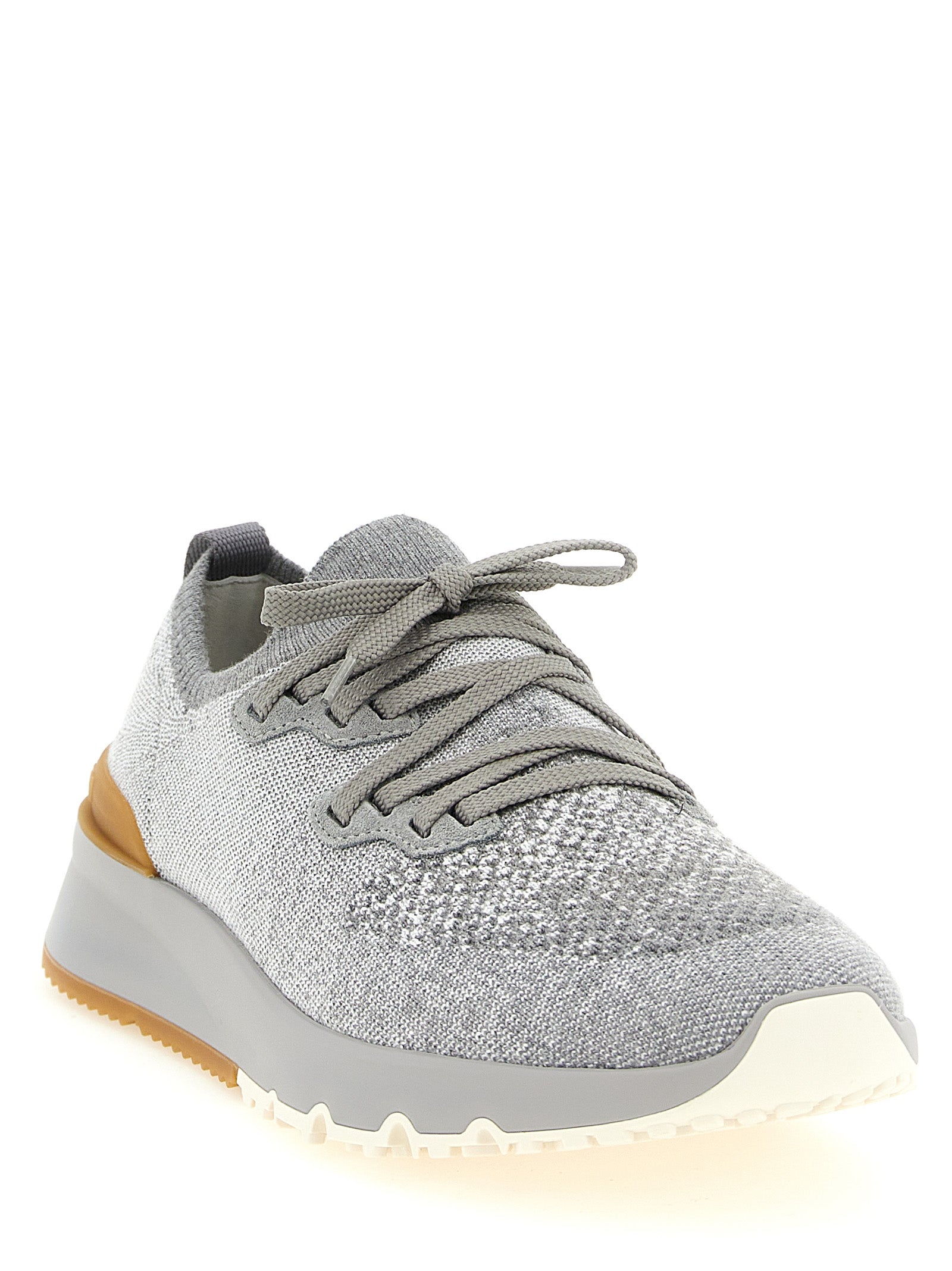 Athletic Sneakers by Brunello Cucinelli for men in stretch polyamide cotton gray features an timeless silhouette from the Men's Slip On Stretch Polyamide Cotton Athletic Sneakers collection, showcasing a timeless slip-on style for a timeless look.