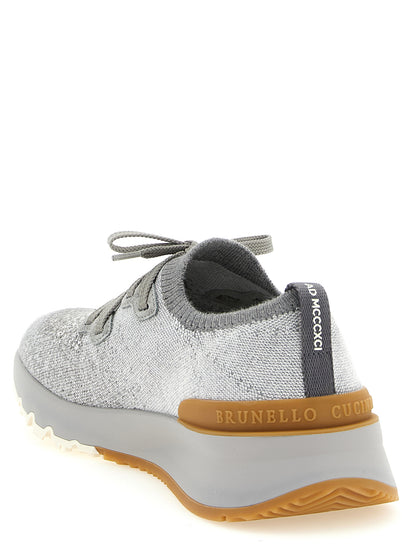 Athletic Sneakers by Brunello Cucinelli for men in stretch polyamide cotton gray showcases an impeccable silhouette, defined by an impeccable slip-on style design that perfectly captures the essence of the Men's Slip On Stretch Polyamide Cotton Athletic Sneakers.