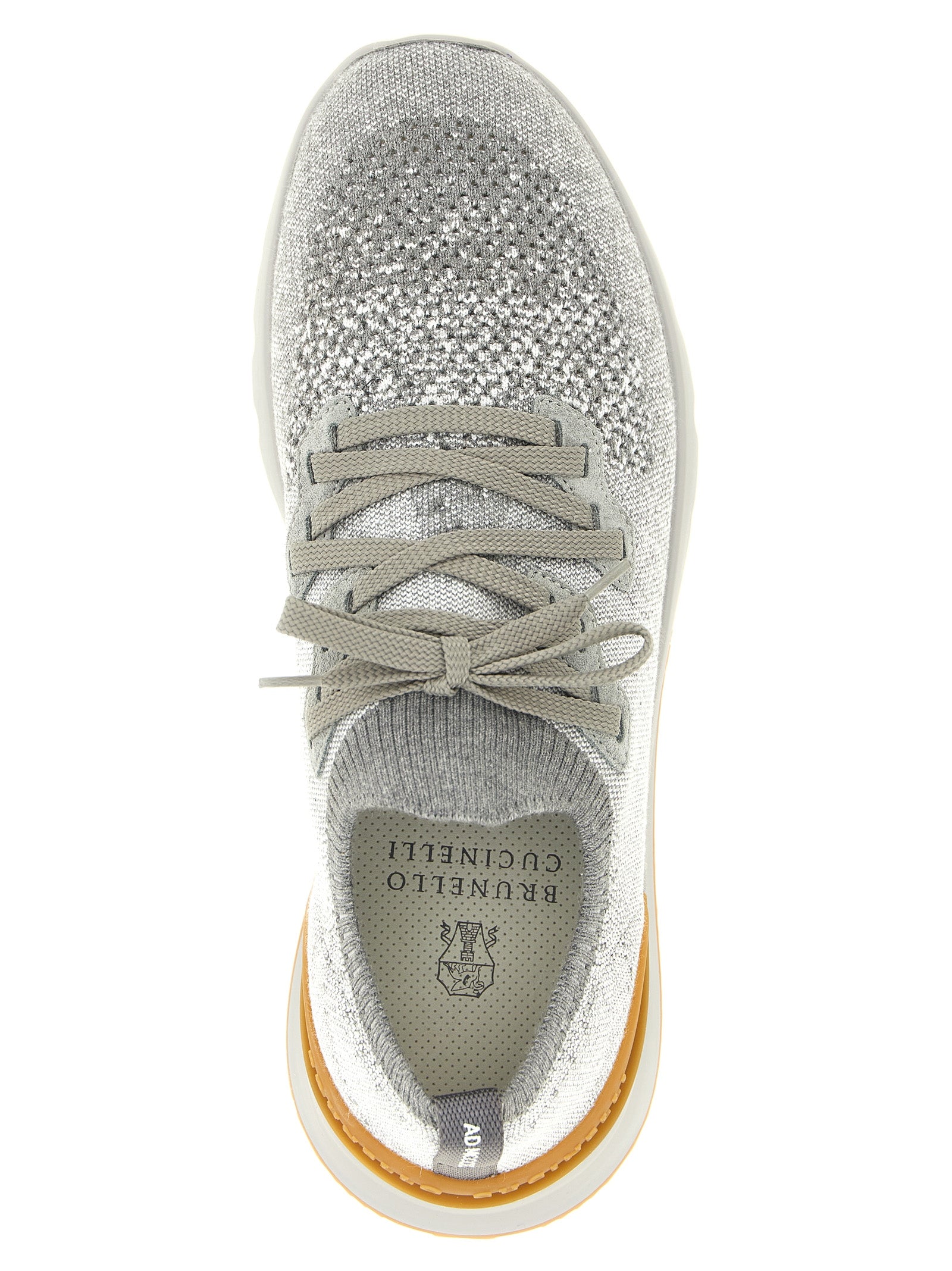 Athletic Sneakers by Brunello Cucinelli for men in stretch polyamide cotton gray showcases a architectural silhouette, artfully capturing the essence of the Men's Slip On Stretch Polyamide Cotton Athletic Sneakers with its signature architectural slip-on style construction.