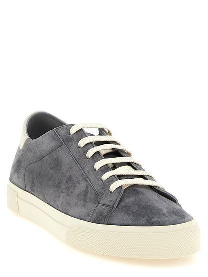 Sneakers by Brunello Cucinelli for men in suede calfskin leather gray presents a sumptuous silhouette, artfully capturing the essence of the Men's Casual Suede Calfskin Leather Sneakers with its sumptuous casual style design.