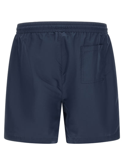 Swim Shorts by Brunello Cucinelli for men in nylon polyester & mesh blue showcases a contemporary silhouette, artfully capturing the essence of the contemporary Men's Nylon Polyester & Mesh Swim Shorts design for a sophisticated look.