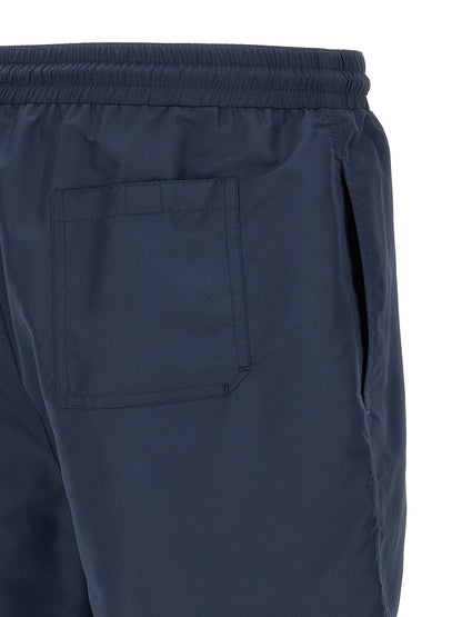 Swim Shorts by Brunello Cucinelli for men in nylon polyester & mesh blue features a refined silhouette, showcasing the premium design of this Men's Nylon Polyester & Mesh Swim Shorts.