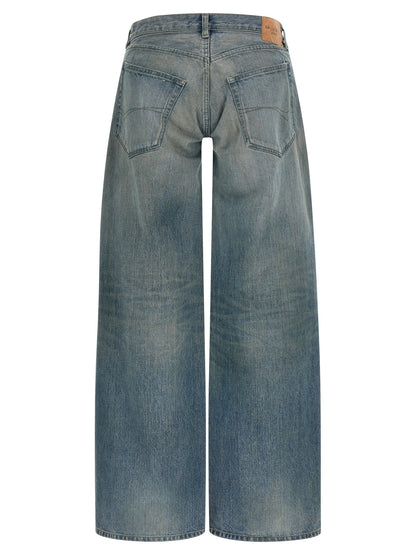 Jeans by Balenciaga for women in organic cotton denim blue & patterned features an sartorial relaxed-fit & wide and long with a low rise cut for a sartorial finish.
