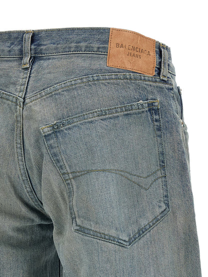 Jeans by Balenciaga for women in organic cotton denim blue & patterned presents a refined pantology silhouette, artfully defined by a refined pantology relaxed-fit & wide, long, and a sophisticated low rise.