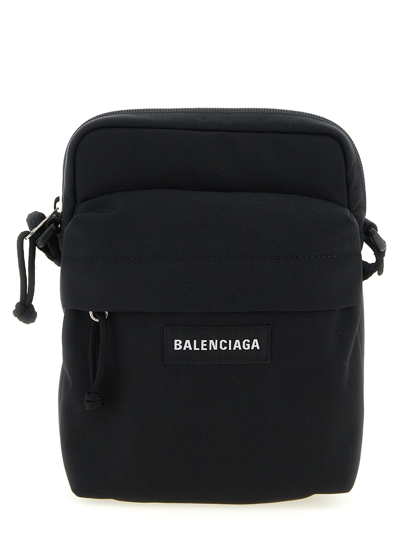 Crossbody Messenger Bag by Balenciaga for men in nylon & polyester black features a distinguished Explorer Nylon & Polyester Crossbody Messenger Bag design with a secure zipper, ample , and versatile crossbody-strap, shoulder-strap & adjustable-strap for a distinguished look.