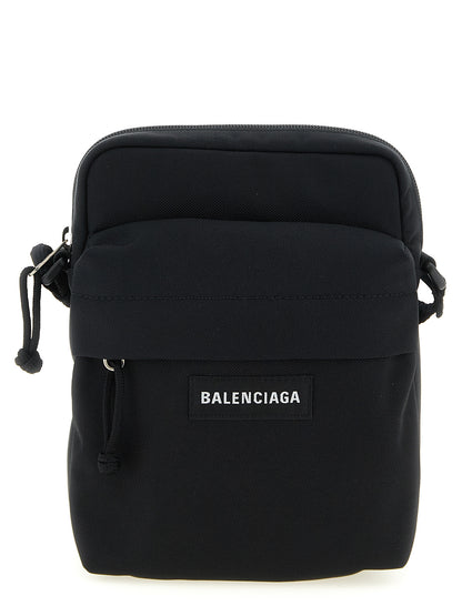 Crossbody Messenger Bag by Balenciaga for men in nylon & polyester black features a distinguished Explorer Nylon & Polyester Crossbody Messenger Bag design with a secure zipper, ample , and versatile crossbody-strap, shoulder-strap & adjustable-strap for a distinguished look.