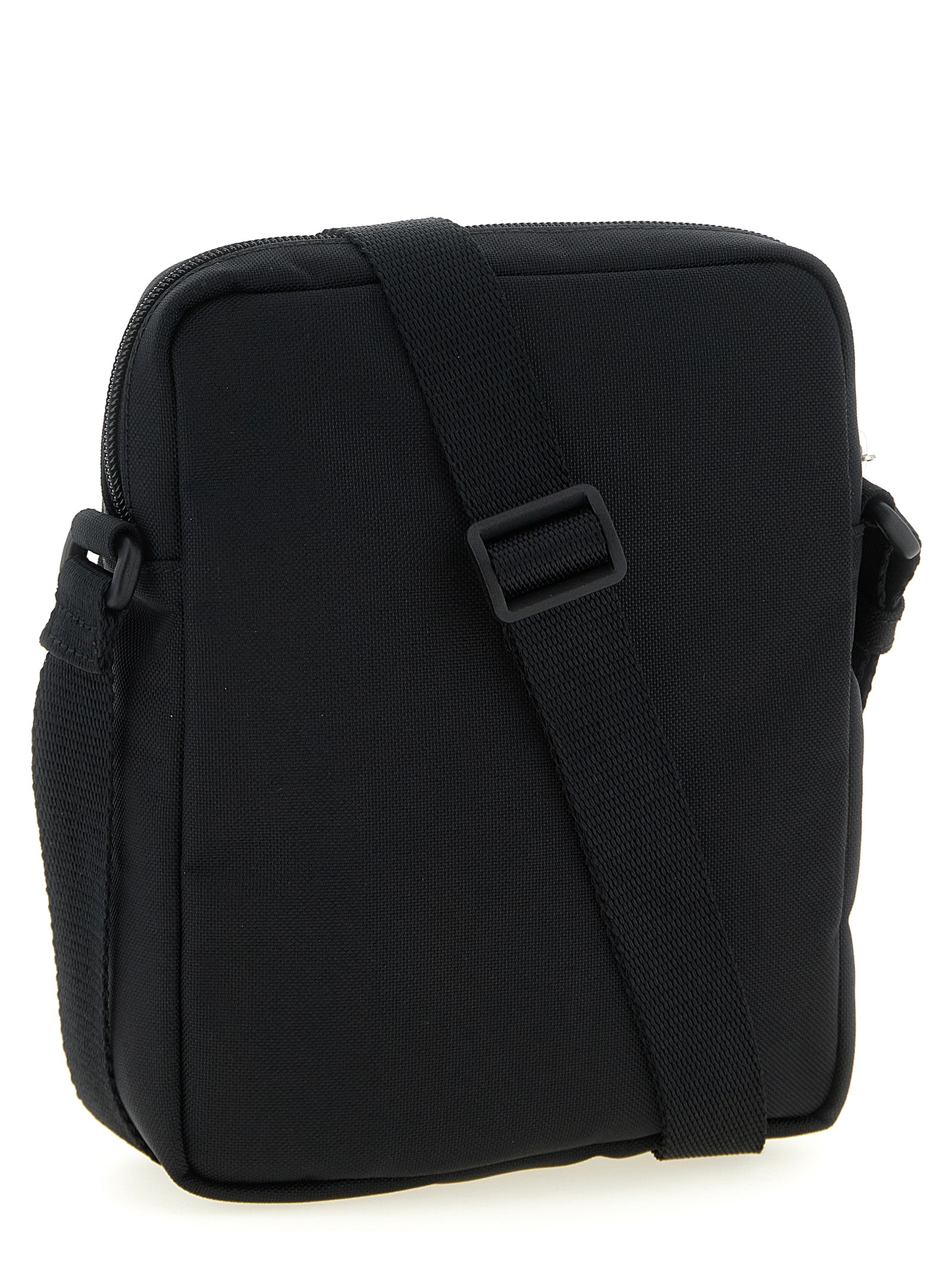 Crossbody Messenger Bag by Balenciaga for men in nylon & polyester black features a statement-making Explorer Nylon & Polyester Crossbody Messenger Bag design with a secure zipper, statement-making , and versatile crossbody-strap, shoulder-strap & adjustable-strap for a sophisticated look.