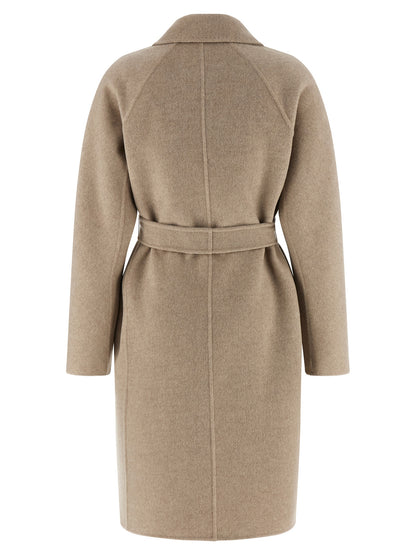 Trench Coat by Max Mara for women in cashmere beige presents a distinguished silhouette, artfully detailed with pockets and a distinguished lapel neckline for a sophisticated, distinguished finish.
