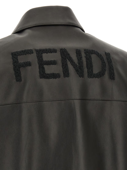 Jacket by Fendi for men in lamb leather black presents a impeccable silhouette, showcasing distinct pockets and a impeccable for a sophisticated finish.