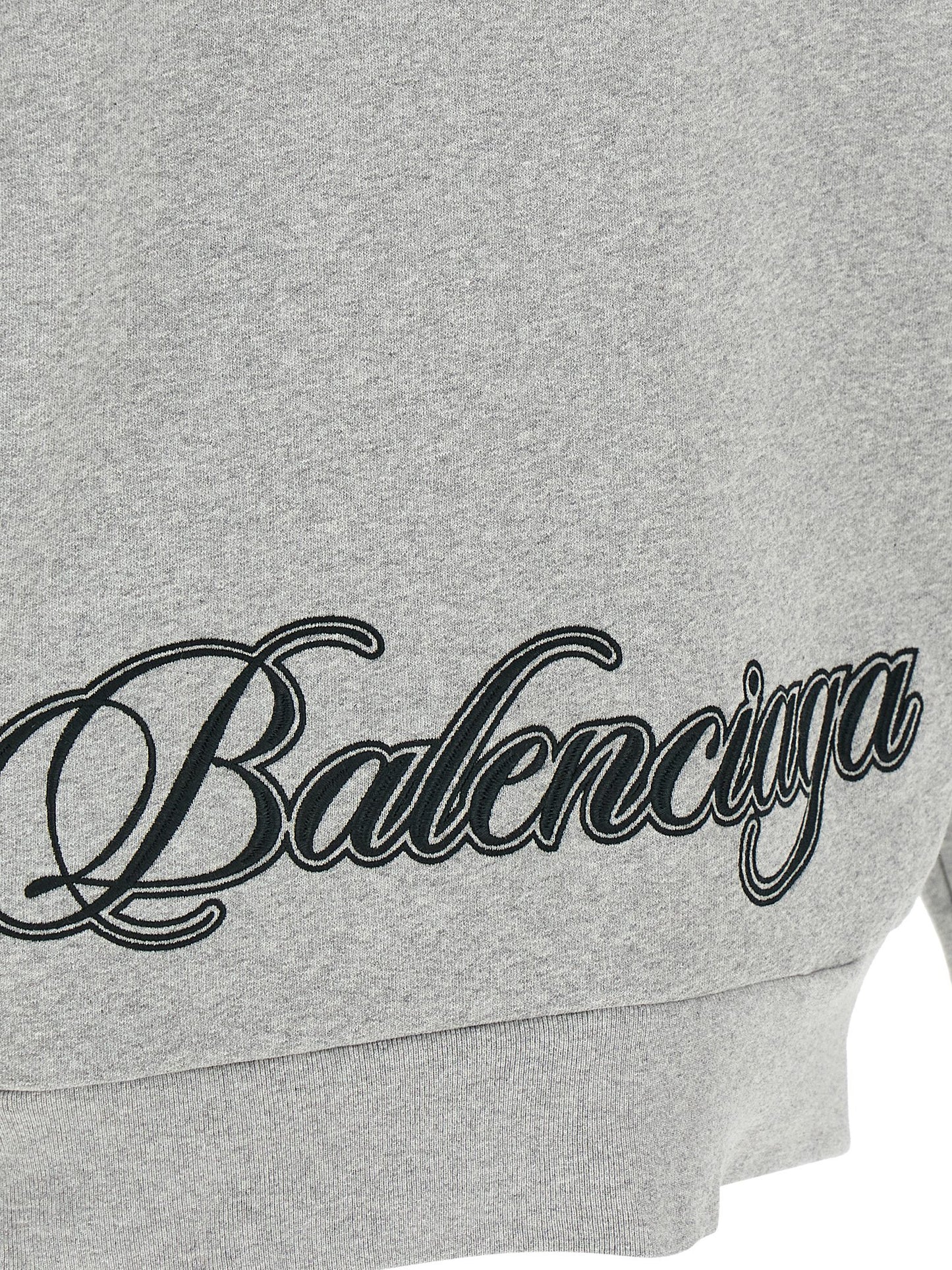 Sweatshirt Hoodie by Balenciaga for women in cotton gray features an avant-garde silhouette, showcasing a sophisticated and detail for a truly avant-garde finish.