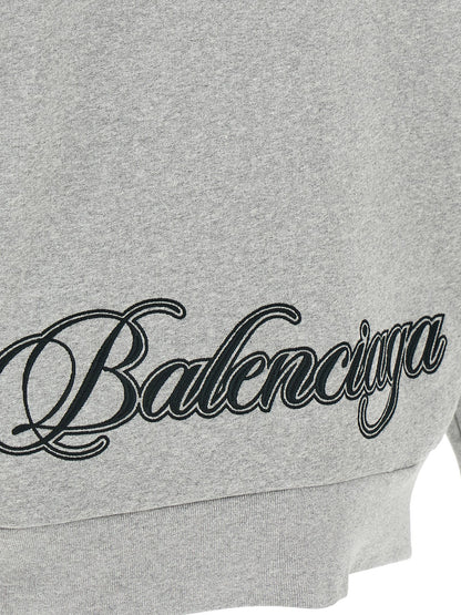 Sweatshirt Hoodie by Balenciaga for women in cotton gray features an avant-garde silhouette, showcasing a sophisticated and detail for a truly avant-garde finish.