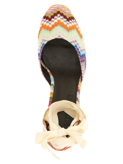 Wedge Sandals by Missoni for women in cowhide leather multicolor & patterned presents a sculptural silhouette, showcasing the Women's Cowhide Leather Wedge Sandals design with a sculptural wedge and for a premium look.